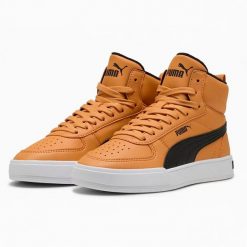 Buty Sportowe Młodzieżowe Puma Caven Mid Fur Jr. Brązowa buty treningowe Puma, na zimę, bez wzorów, z materiału, bez zapięcia, trekkingowe. Za 184.80 zł.