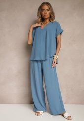 Jasnoniebieski Komplet Bluzka i Luźne Spodnie z Wiskozą i Kieszonkami Efraria. Niebieskie bluzki Renee, l, z aplikacjami, z materiału, eleganckie, bez kołnierzyka, bez ramiączek. W wyprzedaży za 63.99 zł.