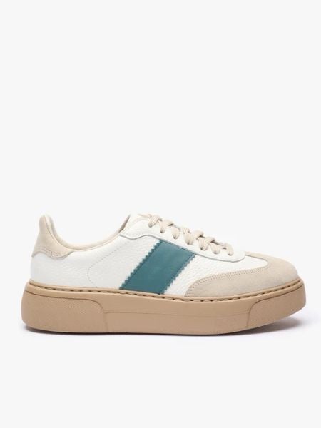 Sneakersy z zielonym akcentem. Brązowe buty sportowe lifestyle Ryłko, bez wzorów, ze skóry, eleganckie, z okrągłym noskiem, bez zapięcia. Za 429.99 zł.