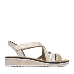 Sandały Rieker. Żółte sandały Rieker, bez wzorów, bez obcasa, na płaskiej podeszwie, bez zapięcia. Za 299.99 zł.