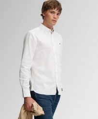 Superdry Klasyczna koszula Oxford z długim rękawem z bawełny organicznej. Białe koszule Superdry, xl, bez wzorów, z bawełny, klasyczne, bez kołnierzyka, bez ramiączek. Za 306.85 zł.