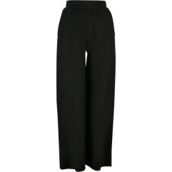 Spodnie dresowe Urban Classics Straight Rib Terry. Czarne spodnie sportowe Urban Classics, bez wzorów, z dresówki, długie. Za 191.00 zł.