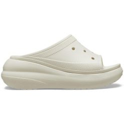 Klapki damskie Crocs Crush Slide Bone Os. Białe klapki Crocs, bez wzorów, z materiału, sportowe, bez obcasa, bez zapięcia. W wyprzedaży za 185.25 zł.