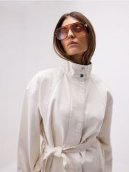 Bawełniana kurtka z wiązaniem - złamana biel. Kurtki Reserved, l, bez wzorów, z bawełny, bez kaptura. Za 149.99 zł.