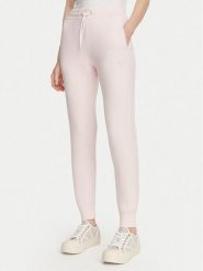 Guess Spodnie dresowe V2YB18 K7UW2 Różowy jasny Regular Fit. Czerwone spodnie dresowe Guess, z aplikacjami, z dresówki. Za 364.99 zł.