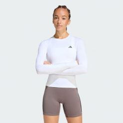 Bluzka z długim rękawem PrimeLift Essentials Workout Contour. Białe bluzki adidas, bez wzorów, sportowe, bez kołnierzyka, bez ramiączek. Za 149.00 zł.