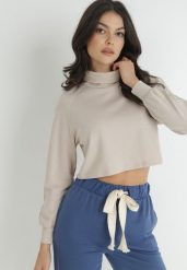 Jasnobeżowy Golf Zarola. Brązowe swetry Born2be, l, z aplikacjami, z bawełny, bez ramiączek. W wyprzedaży za 55.24 zł.