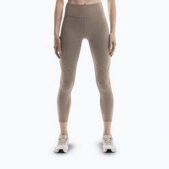 Legginsy treningowe damskie On Performance s 7/8. Brązowe legginsy On, bez wzorów, sportowe. Za 329.99 zł.