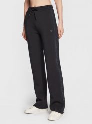 Guess Spodnie dresowe V3RB21 K7UW2 Granatowy Regular Fit. Niebieskie spodnie dresowe Guess, z aplikacjami, z dresówki. Za 239.99 zł.