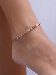 Luja Bijoux Pozłacana bransoletka z kryształami na kostkę rozmiar: onesize. Fioletowe bransoletki Luja Bijoux, z kryształem, pozłacane. Za 59.45 zł.
