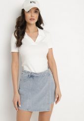 Jasnoniebieskie Jeansowe Spódnico-Szorty o Asymetrycznym Kroju z Ozdobnymi Przeszyciami Lisarennea. Niebieskie szorty Born2be, bez wzorów, z jeansu, eleganckie. Za 169.99 zł.