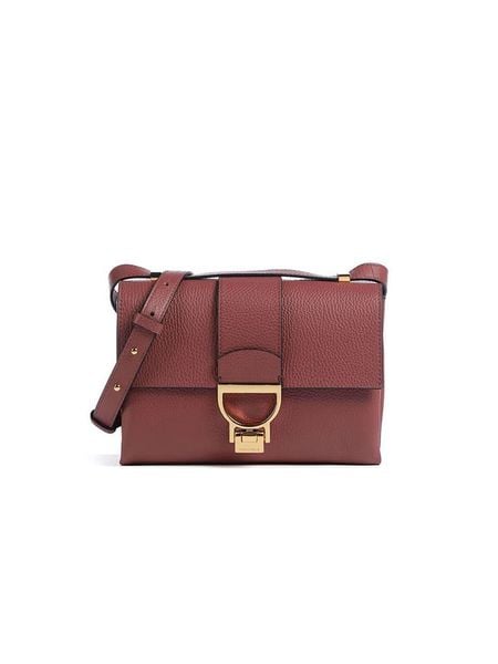 COCCINELLE Skórzana torebka w kolorze bordowym - 23 x 17 x 7 cm rozmiar: onesize. Czerwone torebki klasyczne Coccinelle, bez wzorów, z materiału, przez ramię, bez dodatków. Za 959.56 zł.