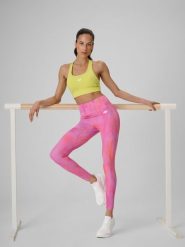 4F Legginsy treningowe szybkoschnące damskie - różowe L. Czerwone legginsy 4f, bez wzorów, z materiału. Za 149.99 zł.