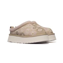 Damskie kapcie Ugg W TAZZ SUN STITCH 1178193-MDSD. Brązowe kapcie UGG, bez wzorów, z gumy. Za 519.00 zł.
