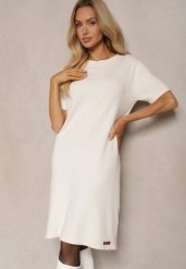 Biała T-shirtowa Sukienka z Wiskozowej Dzianiny z Ozdobnymi Guzikami Narossa. Białe sukienki Renee, na spotkanie biznesowe, l, bez wzorów, z dzianiny, eleganckie, bez kołnierzyka, bez ramiączek, mini. W wyprzedaży za 55.99 zł.