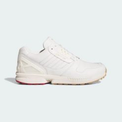 BUTY GOLFOWE BEZ KOLCÓW ZX 8000 RESORT. Białe buty do biegania adidas, bez wzorów, z gore-texu, bez zapięcia, do biegania, adidas zx, gore-tex. Za 699.00 zł.