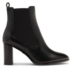 Botki Gino Rossi. Czarne botki Gino Rossi, bez wzorów, bez obcasa, na słupku, bez zapięcia. Za 227.99 zł.
