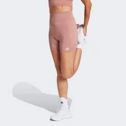 Legginsy Own the Run Short. Czerwone legginsy adidas, bez wzorów, z materiału, sportowe, krótkie. Za 229.00 zł.