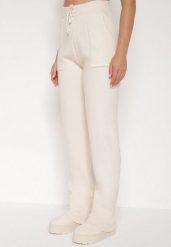 Beżowe Sweterkowe Spodnie z Wełną z Ozdobnymi Kieszeniami Monilana. Brązowe jeansy Born2be, l, bez wzorów, z jeansu. Za 69.99 zł.