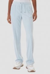 JUICY COUTURE Błękitne spodnie dresowe damskie z cyrkoniami Tina, Rozmiar XS. Niebieskie spodnie dresowe Juicy Couture, bez wzorów, z dresówki. Za 459.99 zł.