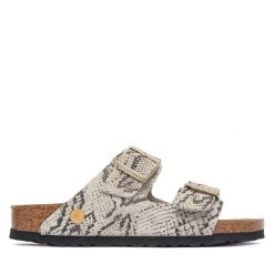Klapki Birkenstock. Brązowe klapki Birkenstock, bez wzorów, bez obcasa, bez zapięcia. Za 629.99 zł.
