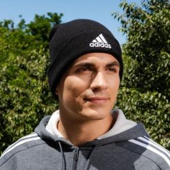 Czapka ADIDAS. Czapki zimowe adidas, bez wzorów, z materiału. Za 69.99 zł.