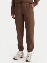 Reebok Spodnie dresowe Reebok X Ewa Chodakowska Evren RK25308CCW Brązowy Regular Fit. Brązowe spodnie dresowe Reebok, bez wzorów, z dresówki. Za 179.99 zł.