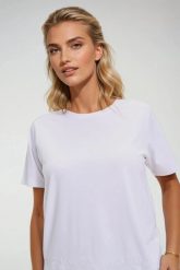 Bluzka z bawełny biała. Białe bluzki MOODO, xs, bez wzorów, z bawełny, bez kołnierzyka, bez ramiączek. Za 59.99 zł.