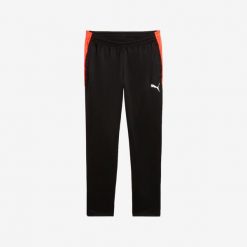 Spodnie piłkarskie Puma IndividualLIGA 25. Spodnie dresowe Puma, bez wzorów, z dresówki. W wyprzedaży za 139.99 zł.