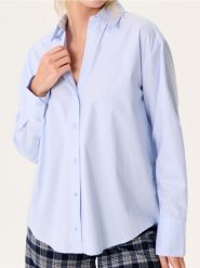 Bawełniania koszula oversize - błękitny. Niebieskie koszule Sinsay, l, bez wzorów, z bawełny, bez kołnierzyka, bez ramiączek. Za 49.99 zł.