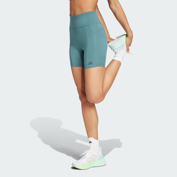 Legginsy Own the Run Short. Niebieskie legginsy adidas, bez wzorów, z materiału, sportowe. Za 219.00 zł.