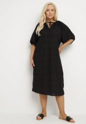 Czarna Bawełniana Sukienka Oversize z Wiązaniem pod Szyją Tolanea. Czarne sukienki Born2be, l, bez wzorów, z bawełny, bez kołnierzyka, bez ramiączek, midi, oversize. W wyprzedaży za 72.24 zł.