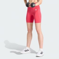 Krótkie legginsy Optimé Essentials Stash Pocket 7-Inch. Zielone legginsy sportowe adidas, xs, bez wzorów, z elastanu, z podwyższonym stanem, do biegania. Za 149.00 zł.