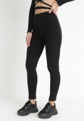 Czarne Legginsy z Gumką w Pasie Varuna. Czarne legginsy Born2be, bez wzorów, z dzianiny. W wyprzedaży za 37.49 zł.