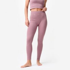 Legginsy do jogi i pilatesu damskie Domyos seamless. Fioletowe legginsy Decathlon, bez wzorów, z elastanu, sportowe. Za 129.99 zł.