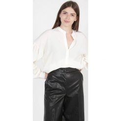 Jedwabna biała koszula Twinset. Białe koszule Twinset, l, bez wzorów, z jedwabiu, bez kołnierzyka, bez ramiączek. W wyprzedaży za 620.00 zł.