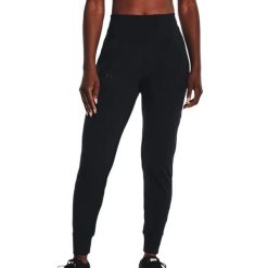 Spodnie treningowe damskie Under Armour Motion Jogger. Czarne spodnie dresowe Under Armour, bez wzorów, z dresówki. W wyprzedaży za 229.75 zł.