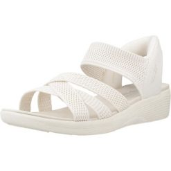 Sandały SKECHERS SLIP-INS ARYA Biały. Białe sandały Skechers, bez wzorów, z materiału, bez obcasa, bez zapięcia. Za 490.00 zł.