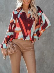 Milan Kiss Bluzka ze wzorem rozmiar: XL. Bluzki Milan Kiss, xl, bez wzorów, bez kołnierzyka, bez ramiączek. Za 130.99 zł.