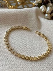 Luseera Pozłacana bransoletka z cyrkoniami rozmiar: onesize. Żółte bransoletki Luseera, z cyrkonią, pozłacane. Za 43.99 zł.