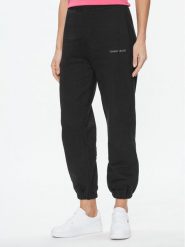Tommy Jeans Spodnie dresowe Classics DW0DW17309 Czarny Relaxed Fit. Czarne spodnie dresowe Tommy Jeans, bez wzorów, z bawełny. Za 259.99 zł.