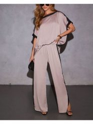 Milan Kiss Spodnie w kolorze beżowym rozmiar: XL. Brązowe spodnie materiałowe Milan Kiss, bez wzorów, z materiału. Za 130.99 zł.