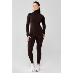 Damska bielizna termoaktywna z golfem Rough Radical Powder. Brązowa bielizna termoaktywna damska ROUGH RADICAL, bez wzorów, bez ramiączek, na golfa. W wyprzedaży za 169.00 zł.