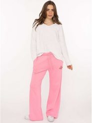 Zwillingsherz Spodnie dresowe "Feel Good Club" w kolorze jasnoróżowym rozmiar: L/XL. Różowe spodnie dresowe Zwillingsherz, bez wzorów, z bawełny. Za 126.99 zł.