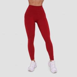 Legginsy damskie fitness z kieszeniami ciemnoczerwone Ignite. Czerwone legginsy GYMBEAM, bez wzorów, z elastanu. Za 112.90 zł.