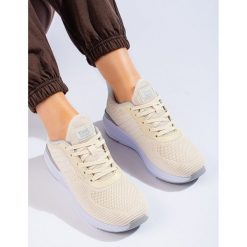 Damskie beżowe buty sportowe DK beżowy. Brązowe buty treningowe bez wzorów, bez zapięcia. Za 212.22 zł.