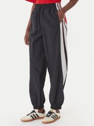 Adidas Spodnie dresowe Sport Santiago KC9116 Czarny Loose Fit. Czarne spodnie dresowe adidas, bez wzorów, z dresówki. Za 349.99 zł.