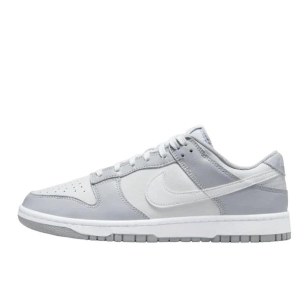 Buty do chodzenia damskie Nike Dunk Low (gs). Białe buty treningowe Nike, bez wzorów, z materiału, bez zapięcia, trekkingowe. Za 379.99 zł.