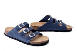 DR. BRINKMANN 701004-05 blau, klapki damskie. Niebieskie klapki Dr. Brinkmann, bez wzorów, ze skóry, bez obcasa, bez zapięcia. Za 229.42 zł.