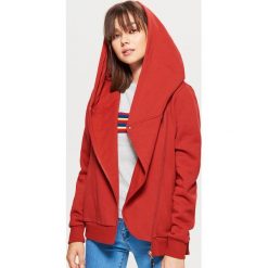 Rozpinana bluza z asymetrycznym zamkiem - Pomarańczowy. Bluzy marki DOMYOS. W wyprzedaży za 39.99 zł.